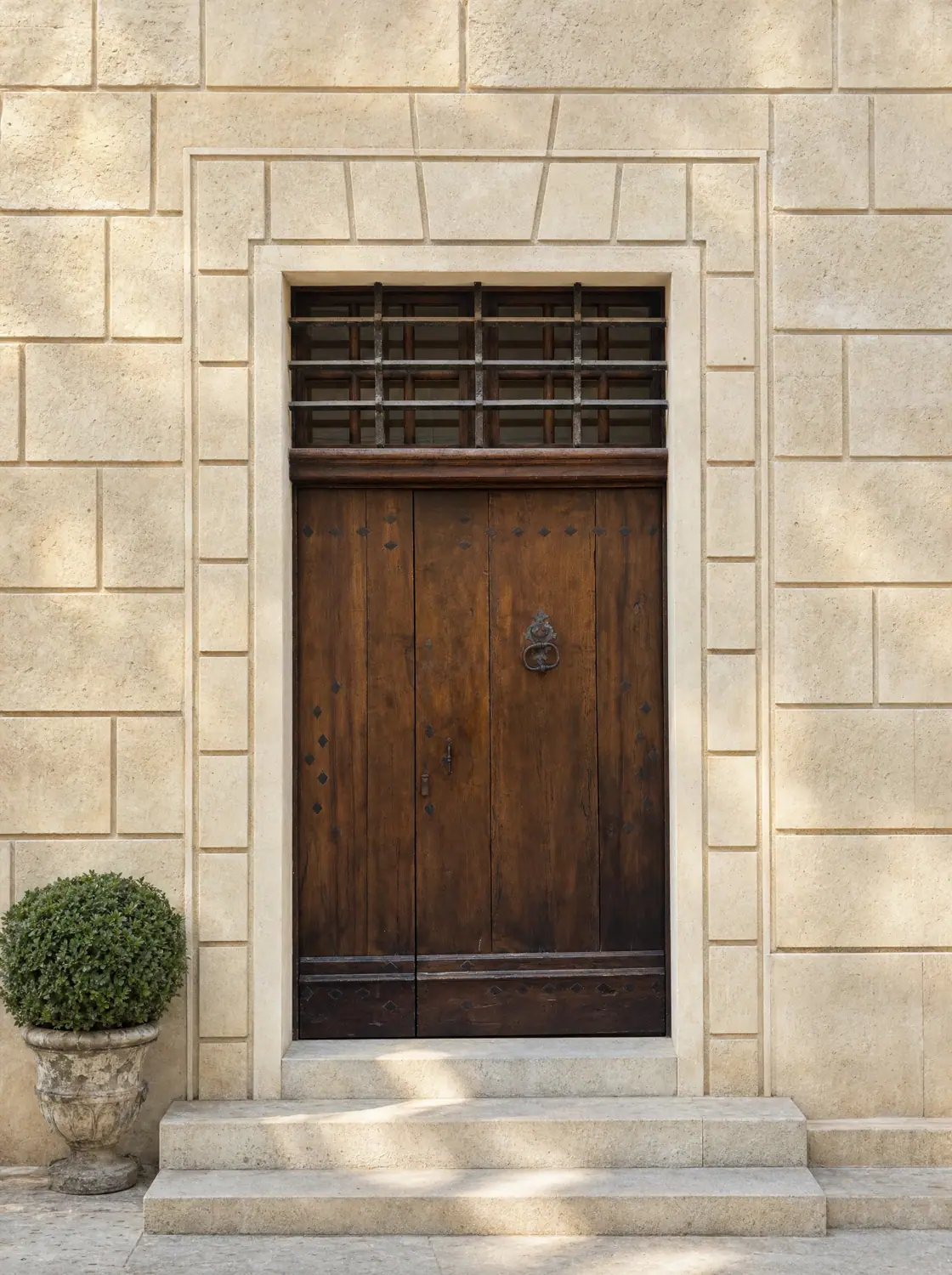 Walnut double door with grille and transom